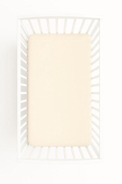 Prześcieradło jersey bawełna z gumką do łóżeczka 140x70cm - kremowe Prześcieradło jersey bawełna z gumką do łóżeczka 140x70cm - kremowe